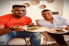 Francis Ngannou shares photos of himself and Kylian Mpabbe eating ndole