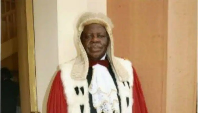 Who was Lord Justice Ayah Paul Abine?